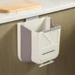 poubelle suspendue cuisine,poubelle pliable,poubelle plan de travail,poubelle tiroir cuisine,bac déchets cuisine,poubelle murale,petit bac cuisine,poubelle alimentaire,accessoire cuisine pratique,rangement cuisine,poubelle compacte,poubelle porte cuisine,mini poubelle cuisine suspendue